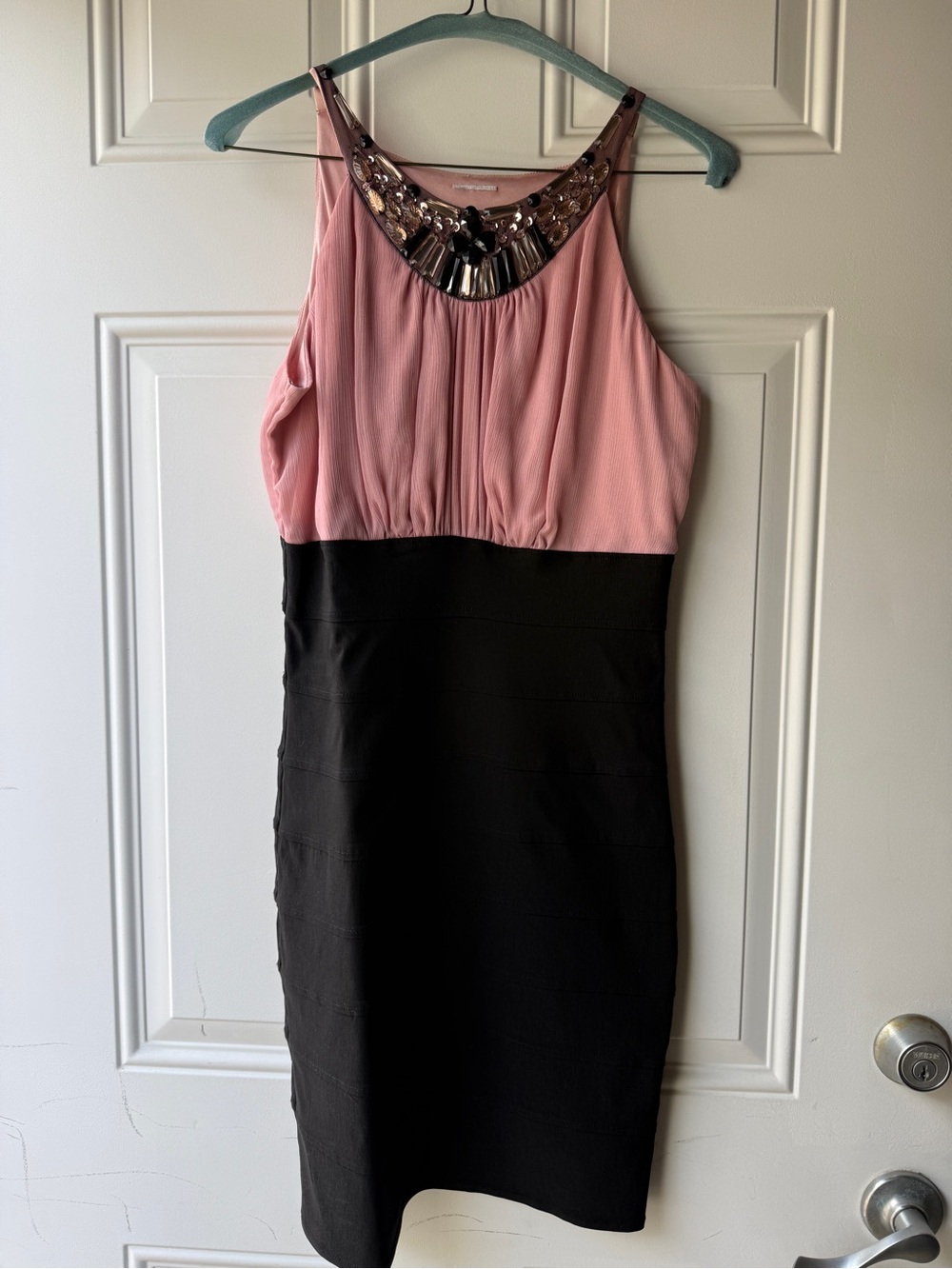 Chic Pink and Black Sleeveless bodycon Dress with Embellished Neckline